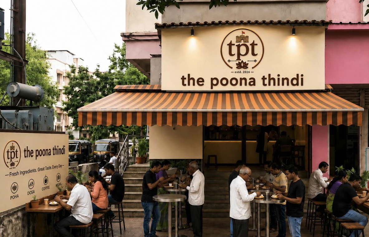 Guests enjoying South Indian food outside The Poona Thindi in Kothrud